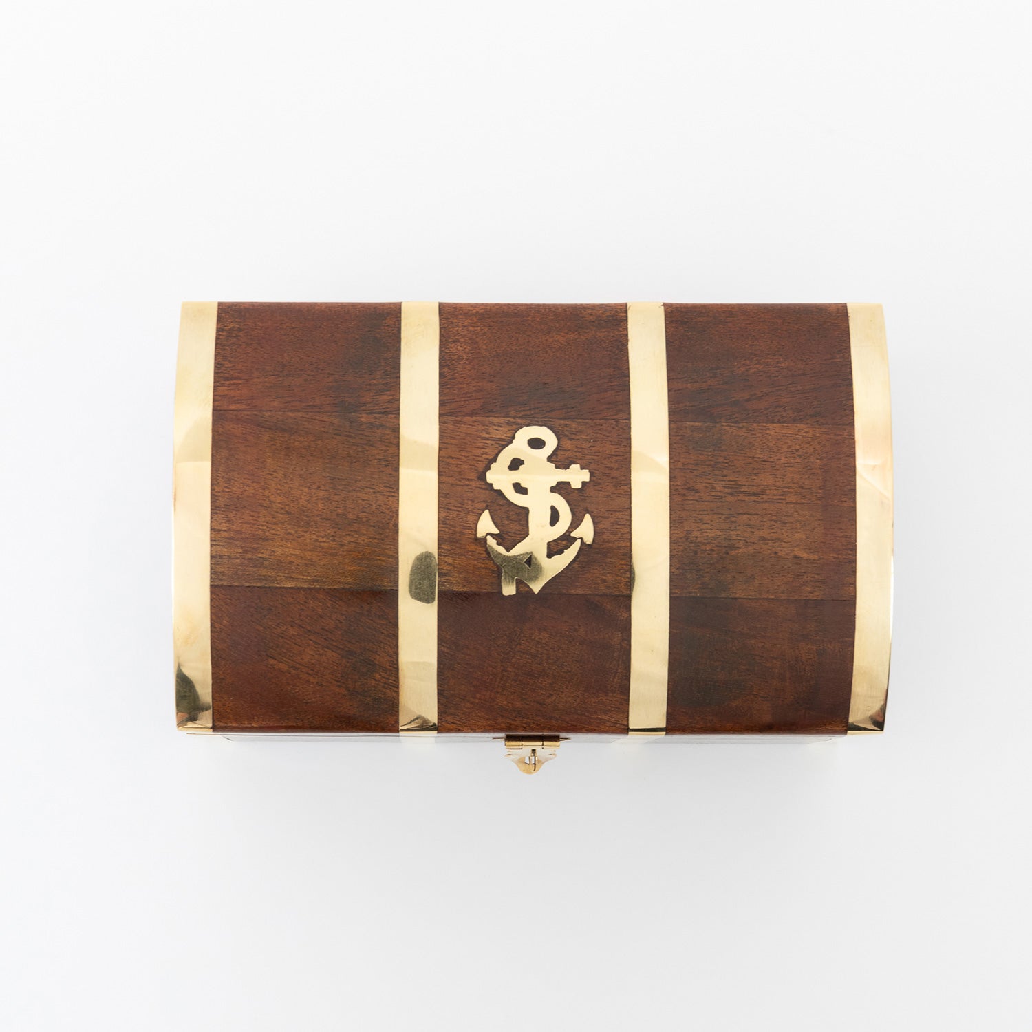 A wooden storage treasure chest adorned with a centrepiece anchor motif. Pictured on a white background.