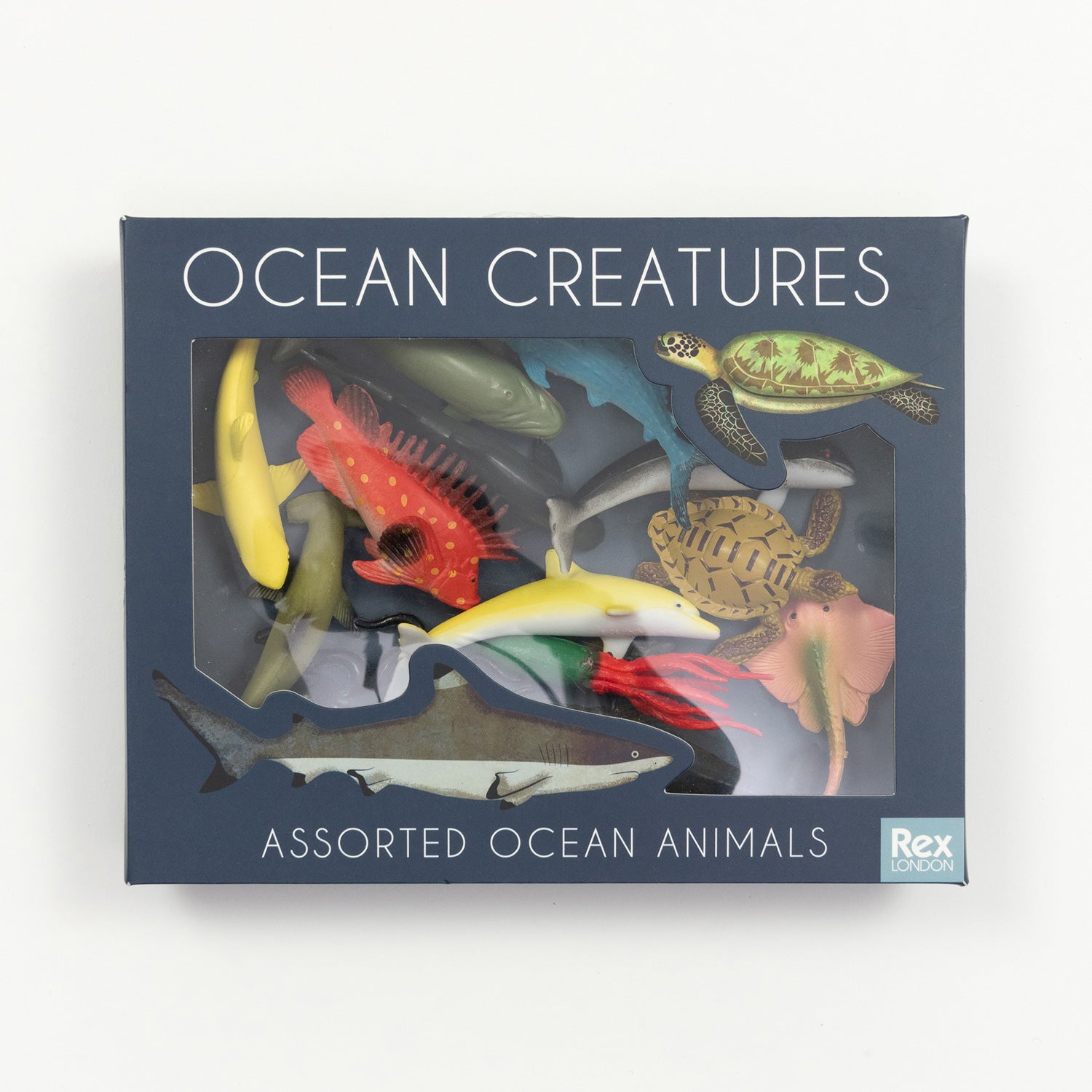 A box of 16 assorted ocean animal toys pictured on a white background. The box is dark blue with a transparent window revealing the toys.