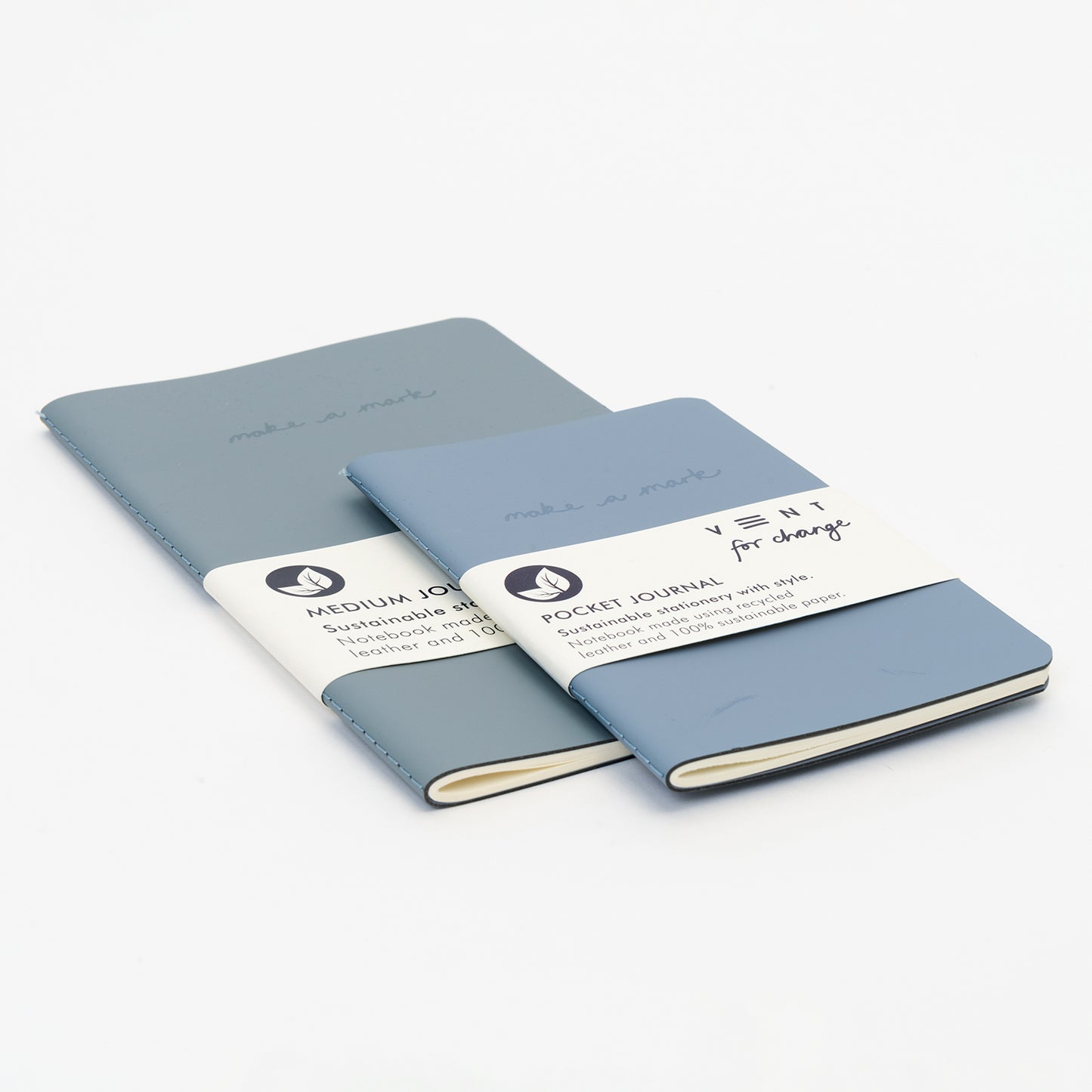 a medium and a pocket size dusty blue leather journal