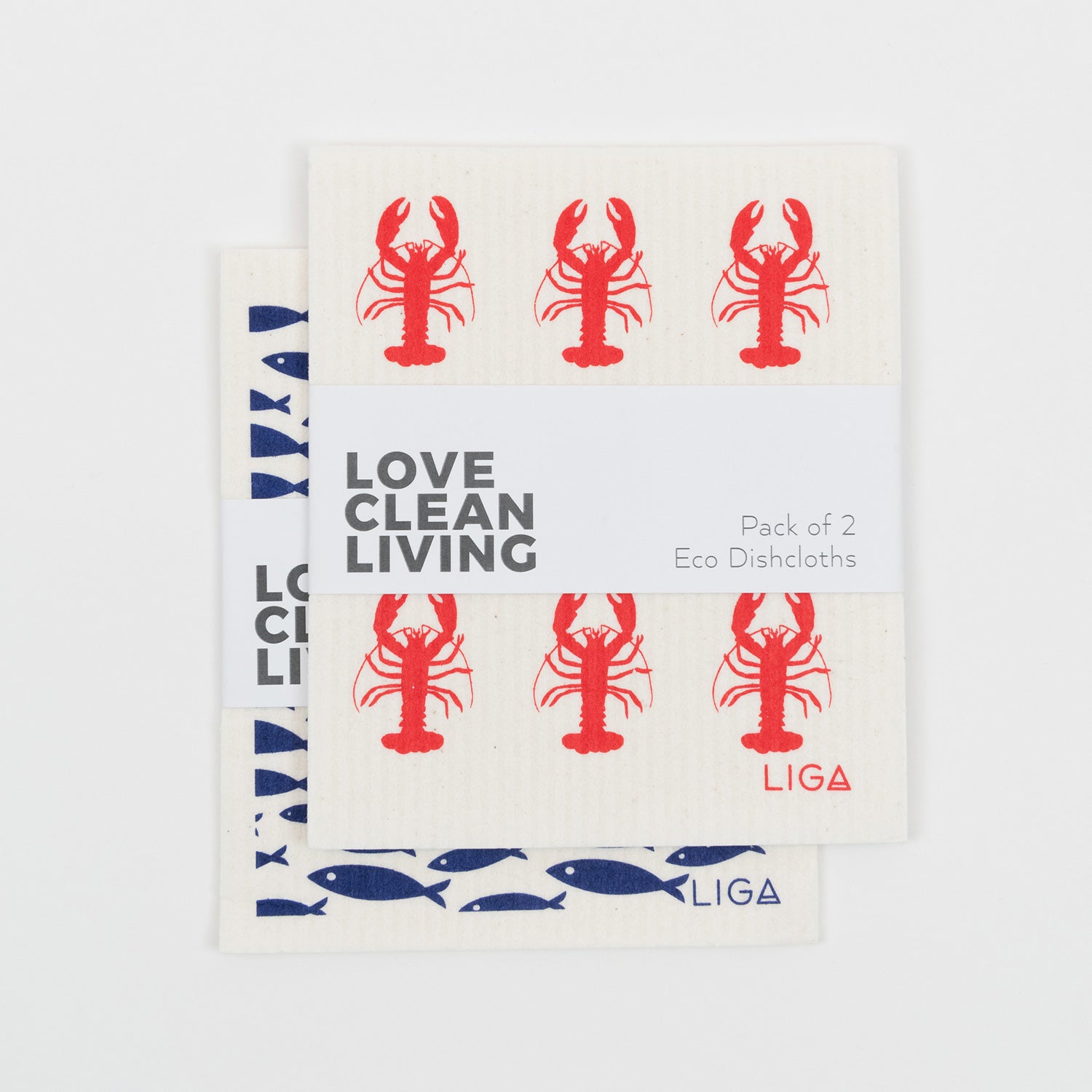 Red lobster dishcloth and blue fish dishcloth piled on top of each other in their packaging.