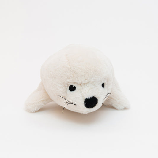 A white plush seal soft toy on a white background.