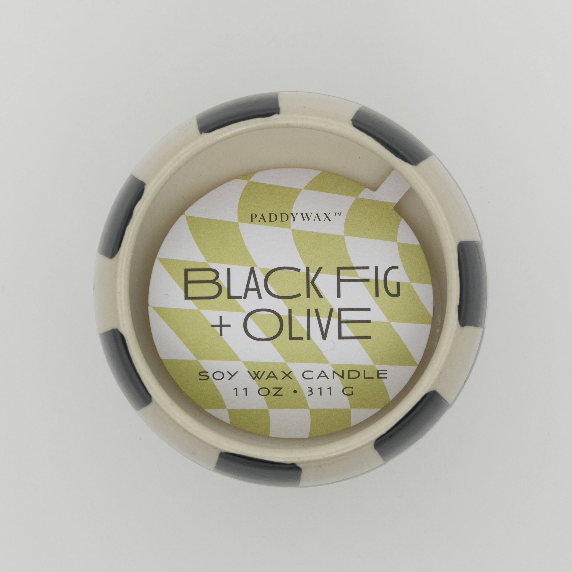 Shot from above showing the scent card on top of the candle.