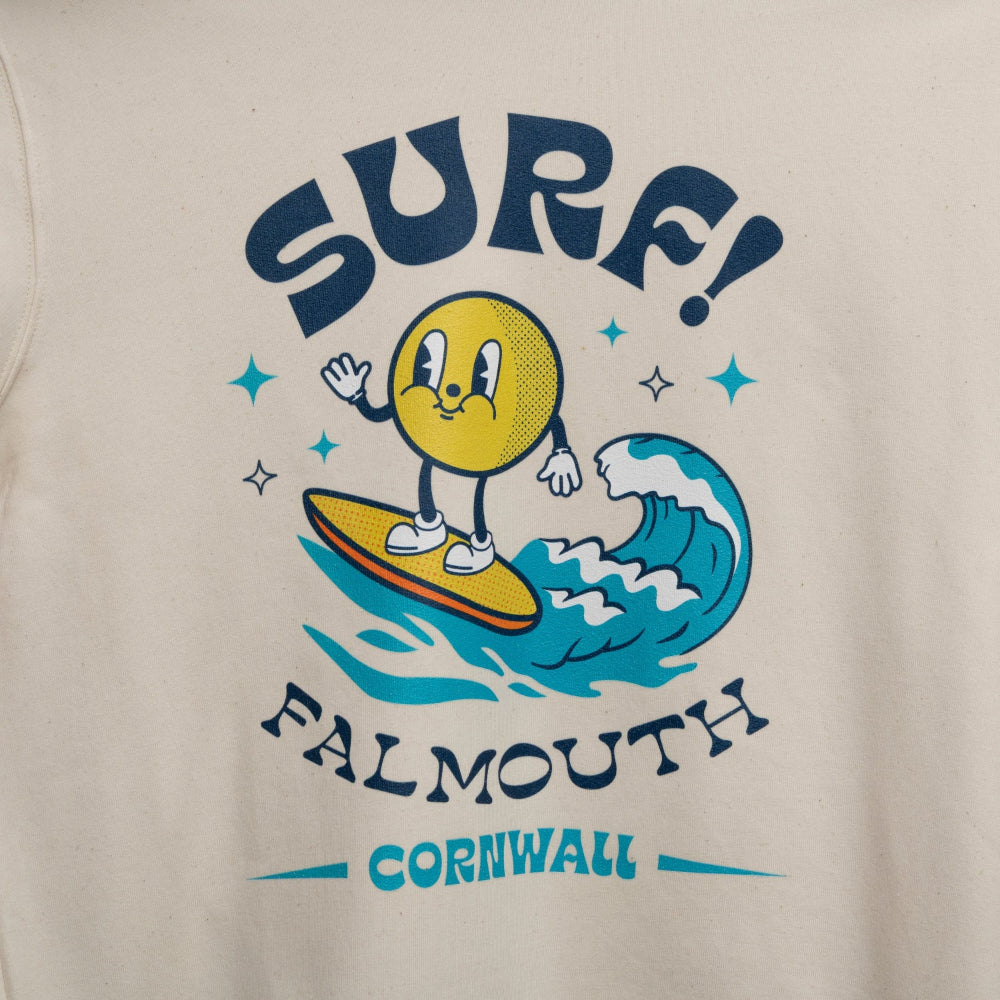 Close up of motif of a character surfing a wave surrounded by the words Surf, Falmouth, Cornwall.