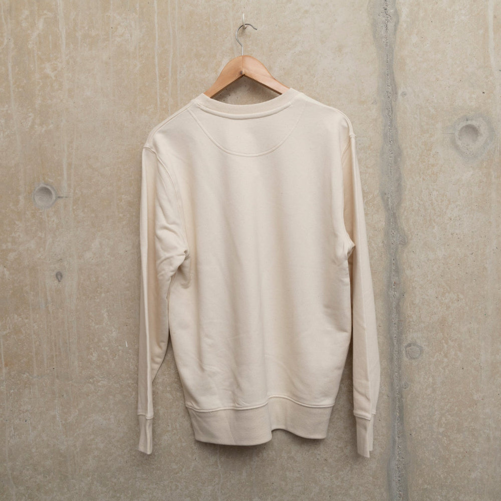 Plain back of cream sweatshirt