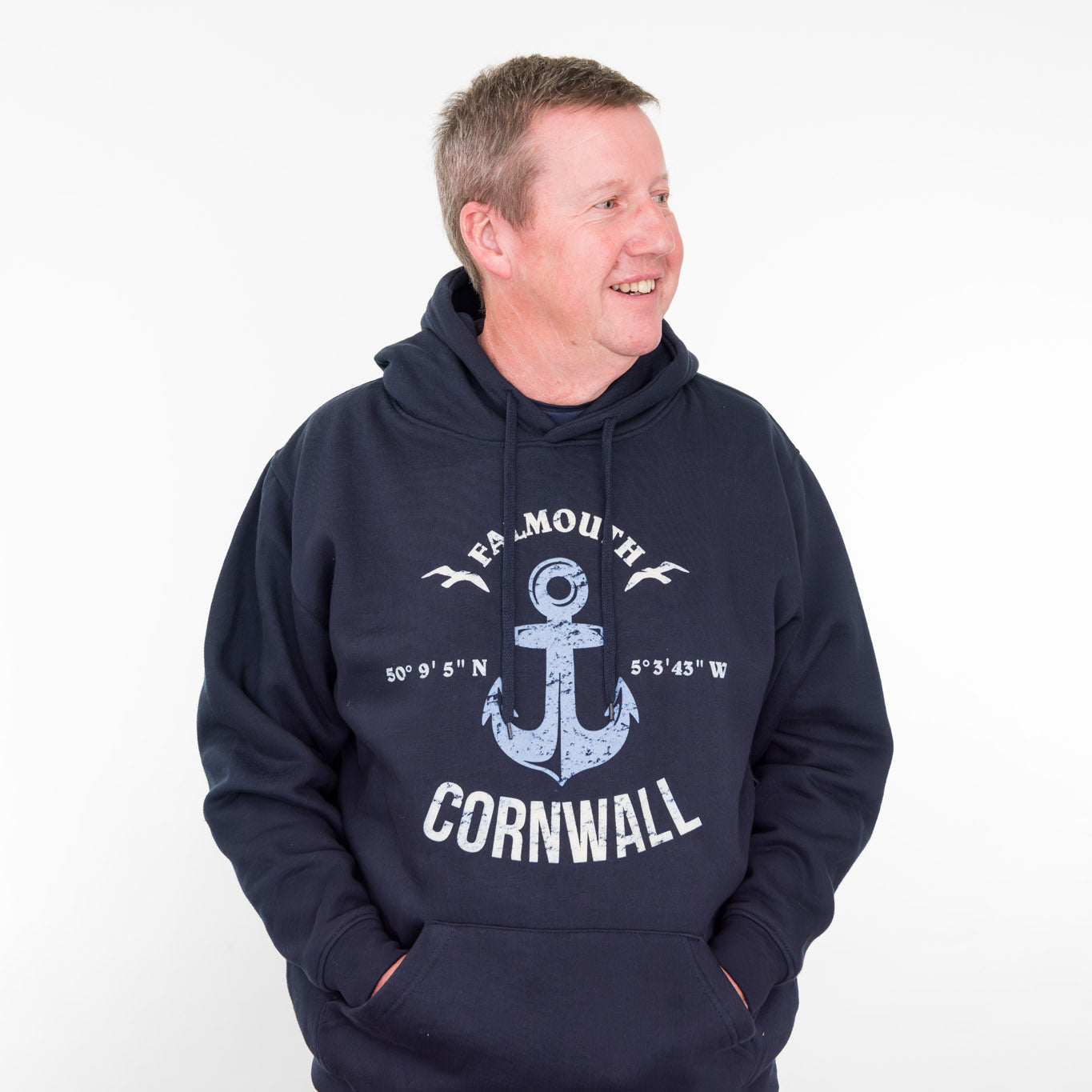 A man wearing the Falmouth hoodie.