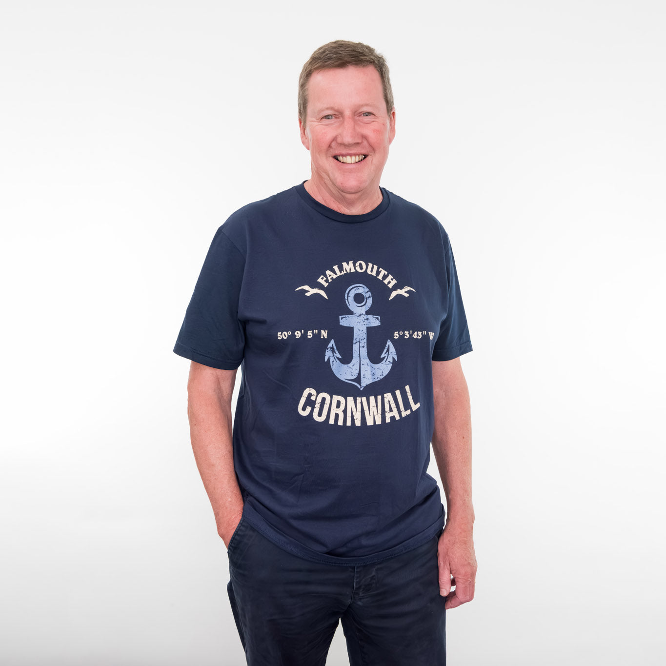 A man wearing the Falmouth t-shirt.