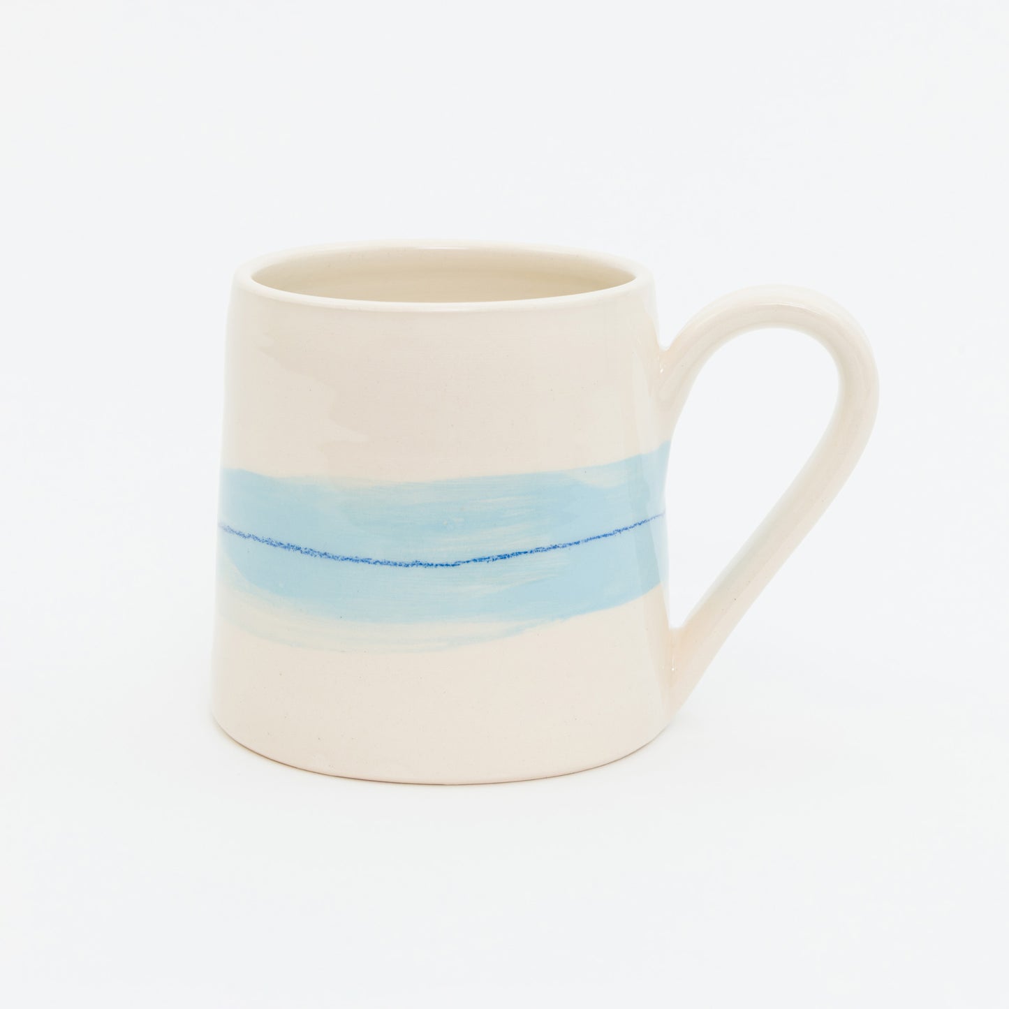White mug with blue stripes on a white background