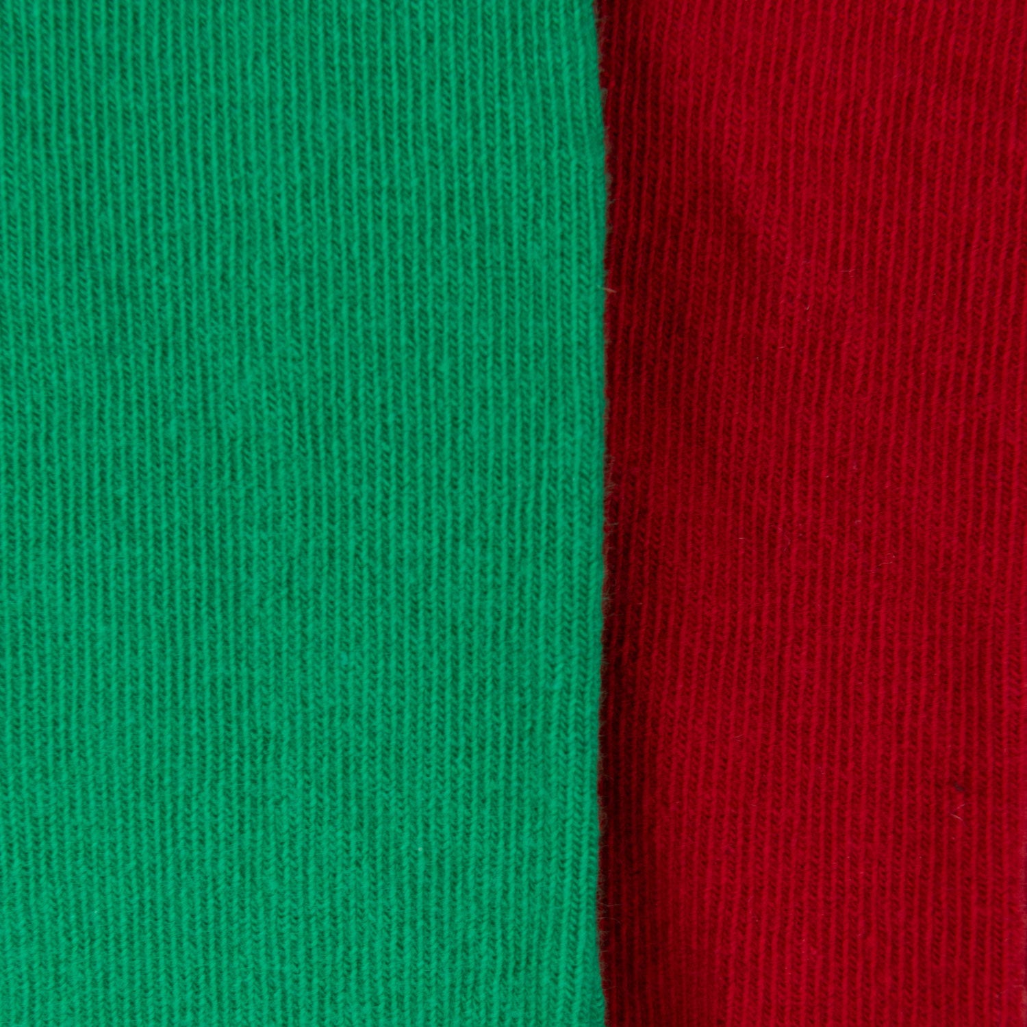 Close up of sock fabric and colour for Port & Straboard Socks. One green sock, one red sock.