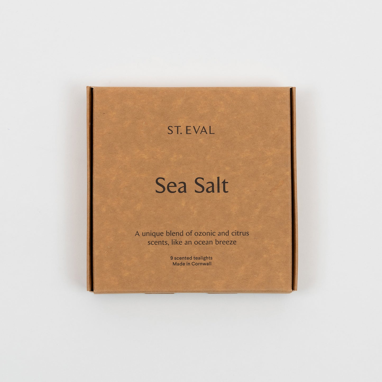 St Eval Sea Salt Tea Lights box of 9 candles. Plain earthy card box stating St Eval, Sea Salt, A unique blend of ozonic and citrus scents, like an ocean breaze, 9 scented tealights, made in Cornwall.