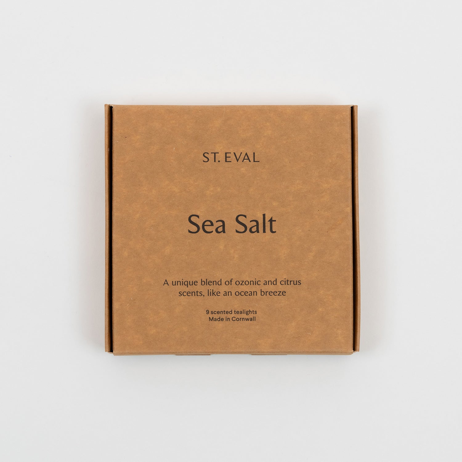 St Eval Sea Salt Tea Lights box of 9 candles. Plain earthy card box stating St Eval, Sea Salt, A unique blend of ozonic and citrus scents, like an ocean breaze, 9 scented tealights, made in Cornwall.