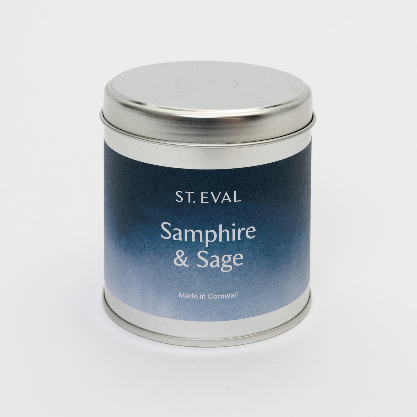 Blue and white label on the tin candle