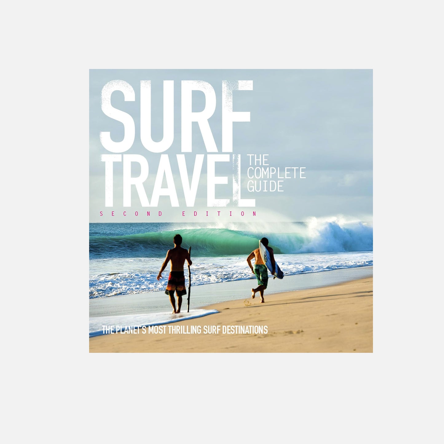 Cover design for "Surf Travel: The Complete Guide, Second Edition," featuring two surfers walking on a beach with waves in the background.