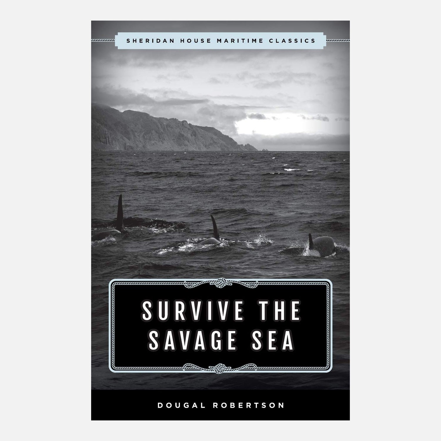 A scan of the book Survive the Savage Sea by Dougal Robertson. The cover has a black and white photo of three killer whales swimming in the sea with cliffs in the distance.