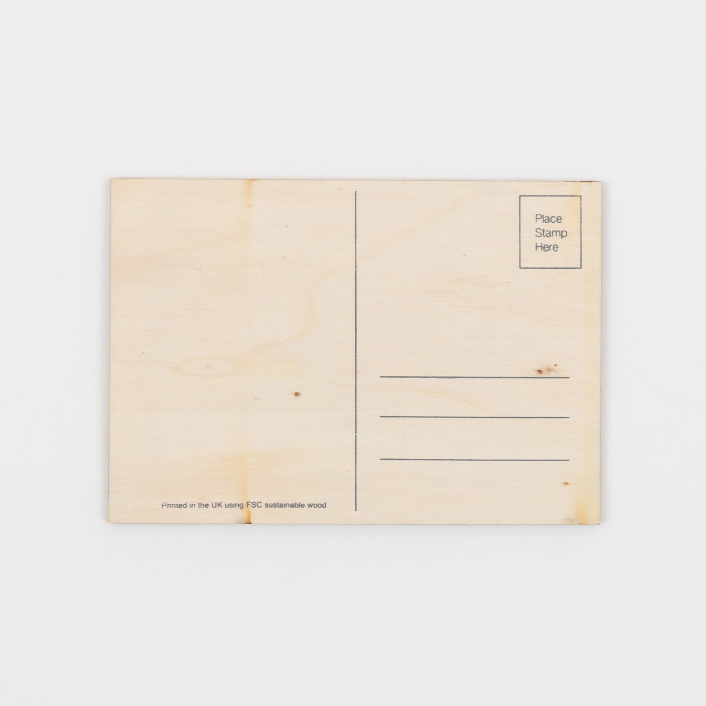 Back of the wooden postcard with room for a message, address and a stamp.