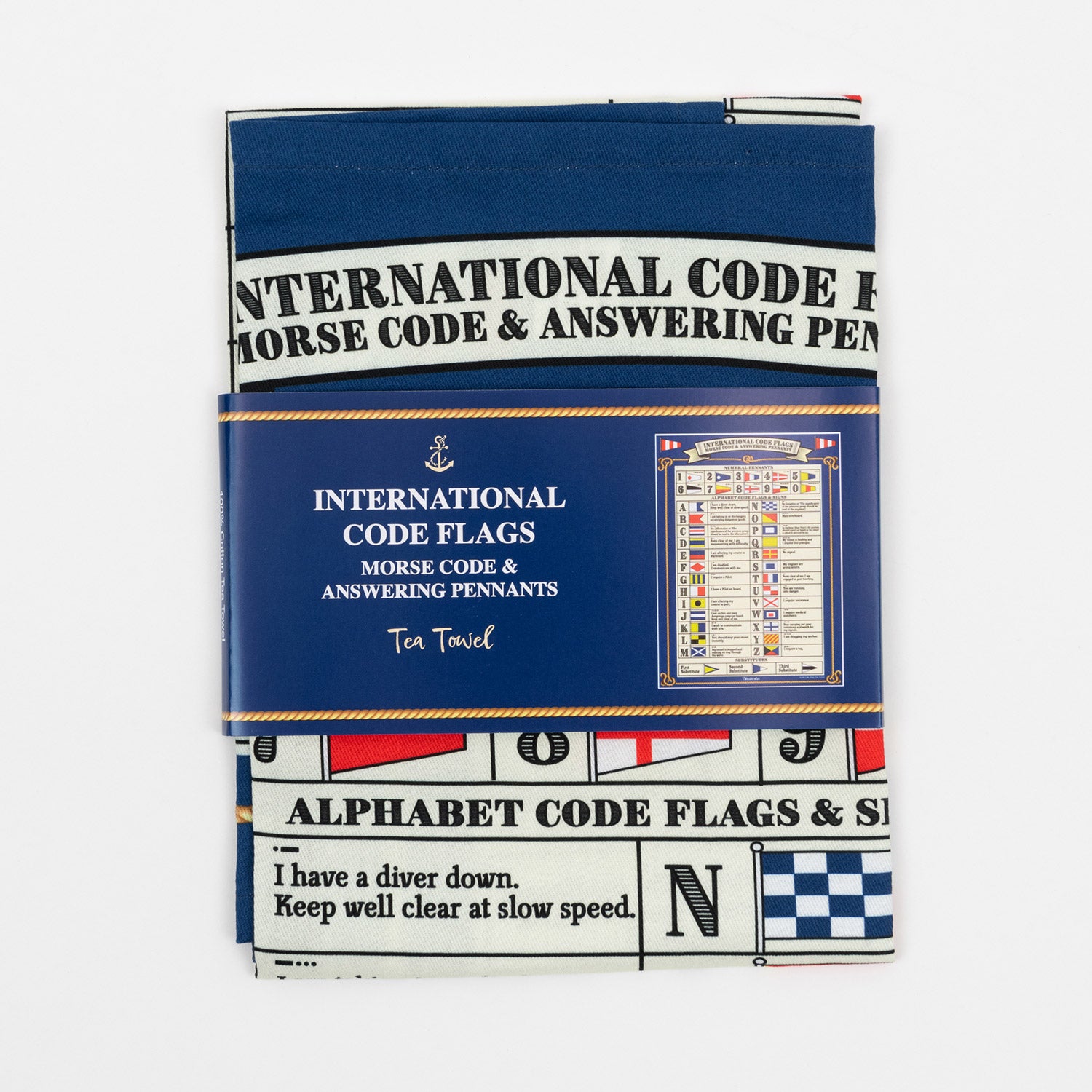 Multi-coloured international Code Flags tea towel with flags for each letter of the alphabet and for numbers 0 to 9. The tea towel is folded and in its packaging.