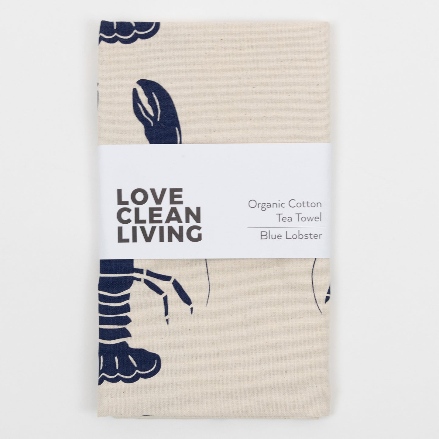 The Blue Lobster Tea Towel in its packaging.