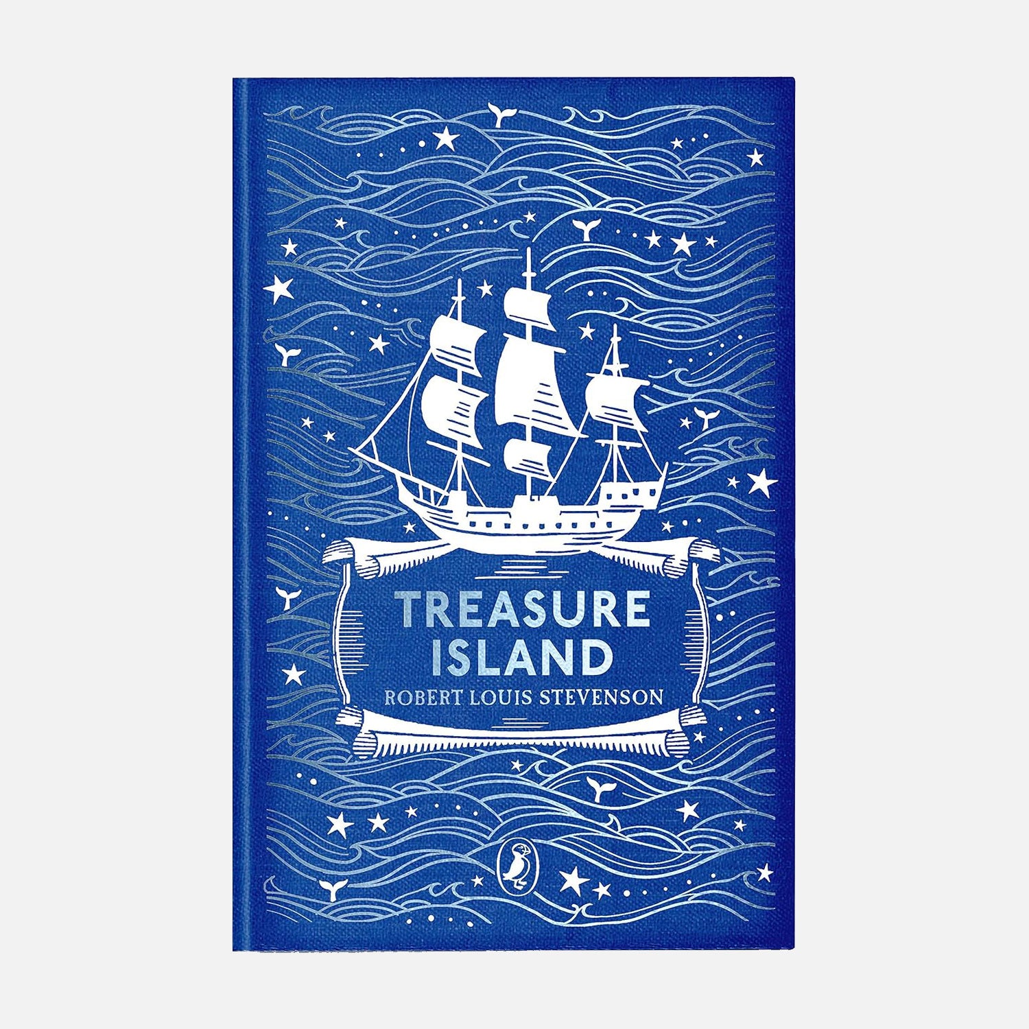 Treasure Island: Puffin Clothbound Classics. Navy Blue cloth cover with silver Pirate ship and sea depiction. Treasure Island by Robert Louis Stevenson
