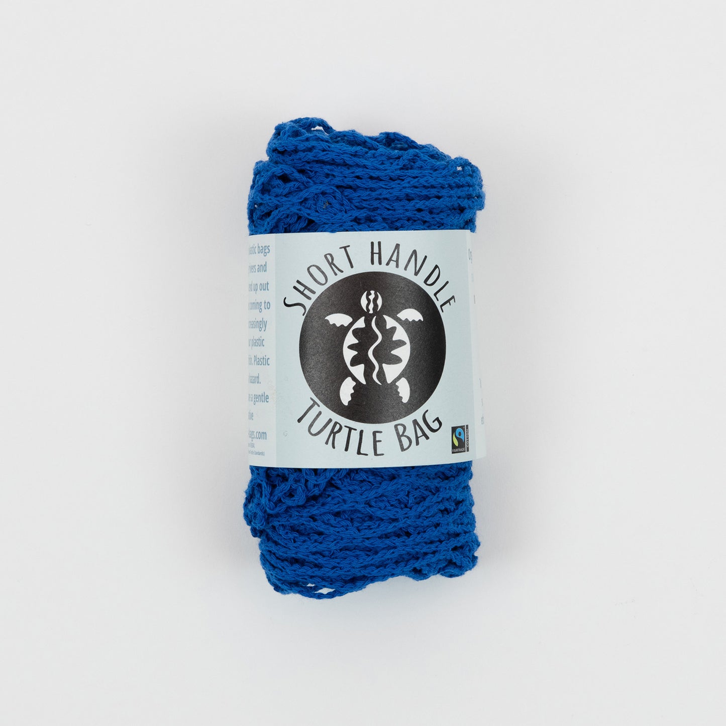 blue string shopping bag with short handles, in packaging