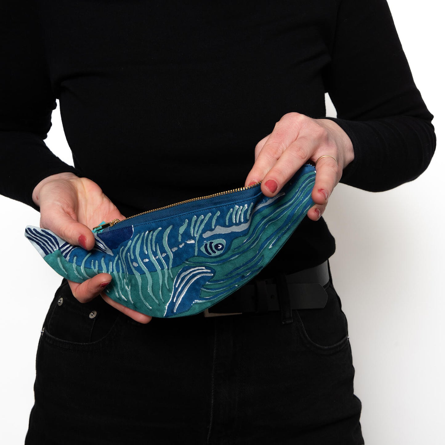 model unzipping the whale case