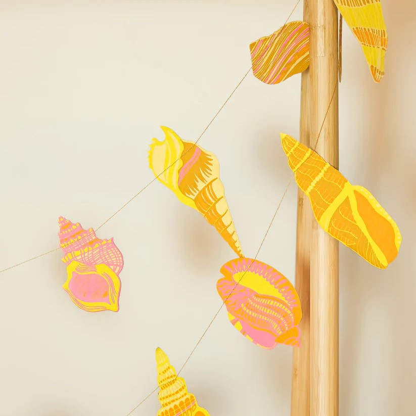 images of the cut out shells along the garland