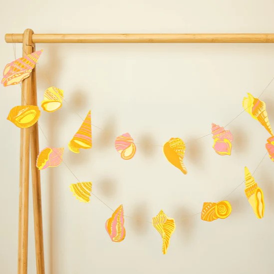 images of the cut out shells along the garland