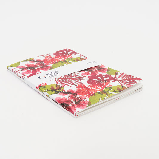 3/4 shot of the pack of notebooks featuring the pressed seaweed designs