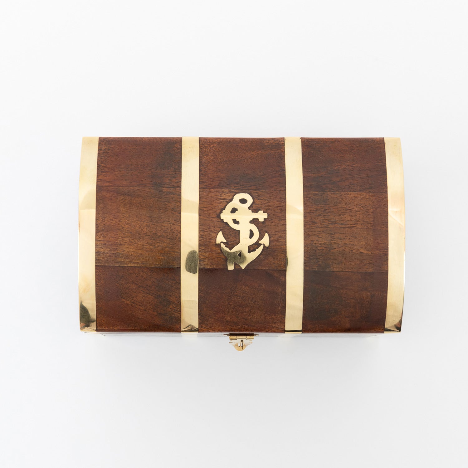 A wooden storage treasure chest adorned with a centrepiece anchor motif. Pictured on a white background. 