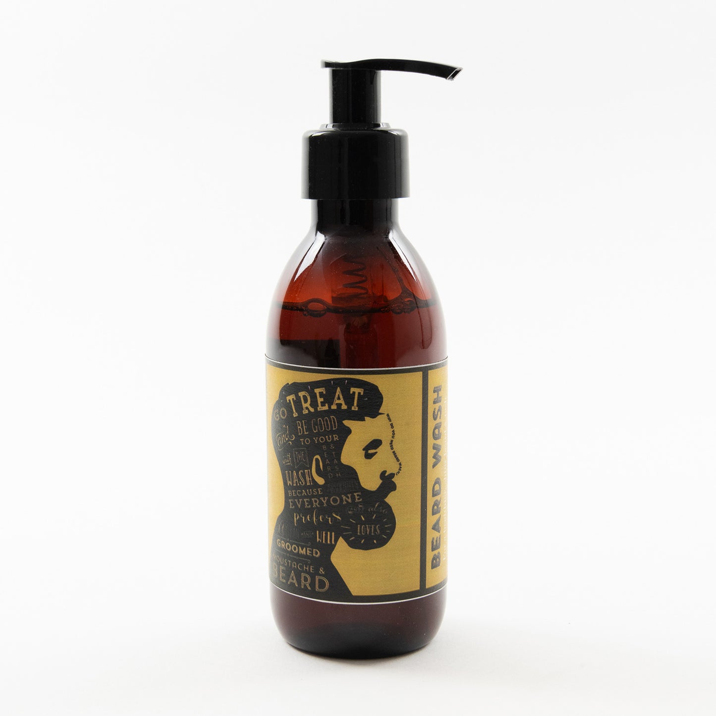 A bottle of beard wash pictured on a white background. It's a dark brown bottle with a white and yellow label. The label features an illustration of a man's face in profile with a large beard.