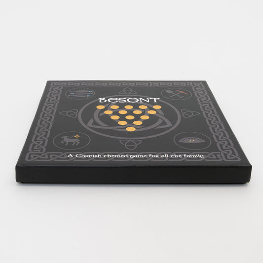 Black and yellow design on the top of the games box