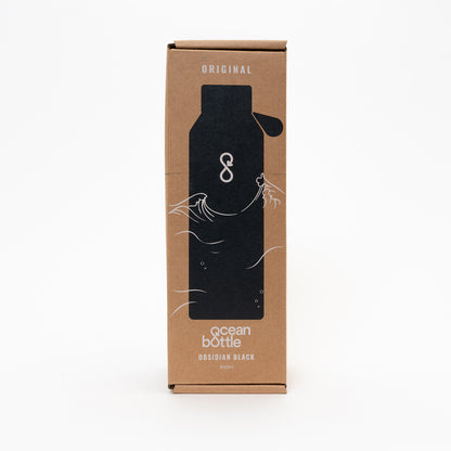 cardboard packaging for the black drinks bottle