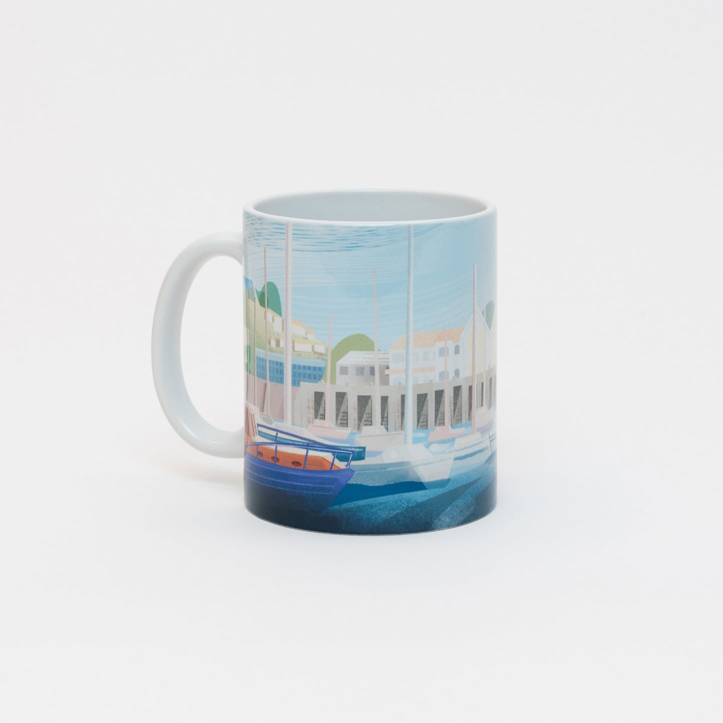 The back view of the white mug with an illustration of National Maritime Museum Cornwall and Falmouth.