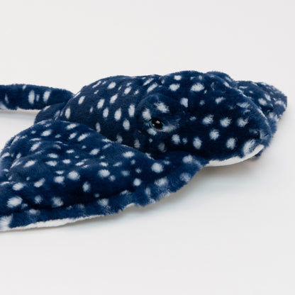 A plush ray soft toy, blue with white spots, pictured on a white background.