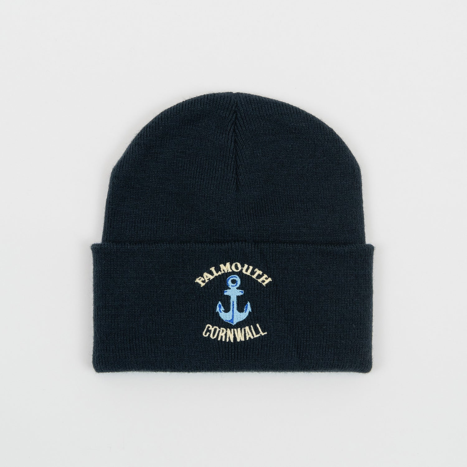 Navy beanie hat with Falmouth, Cornwall embroidered in white around an anchor embroidered in blue