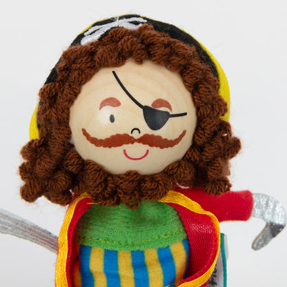 Close-up of the wooden and fabric pirate finger puppet .