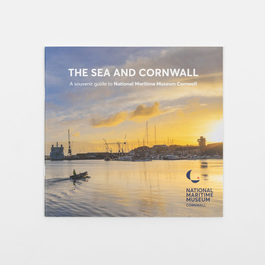 The sea and Cornwall. A souvenir guide to National Maritime Museum Cornwall. Cover shows a sunset image of Falmouth town with the museum in silhouette. 