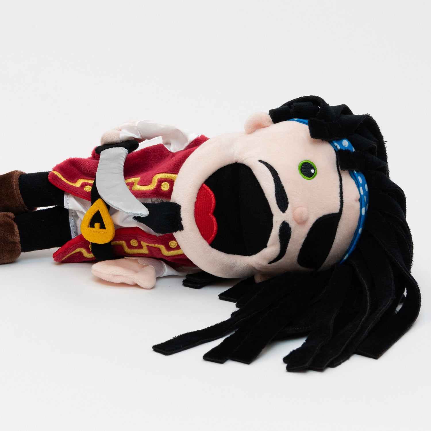 Pirate Hand Puppet. The adorable details of this fun fabric character include fabulous black floppy hair, a silver pirate sword, and a moving mouth with toune. Complete with black eyepatch, mustache & goatee, Red and gold detailed vest and belt, a white shirt and brown boots.