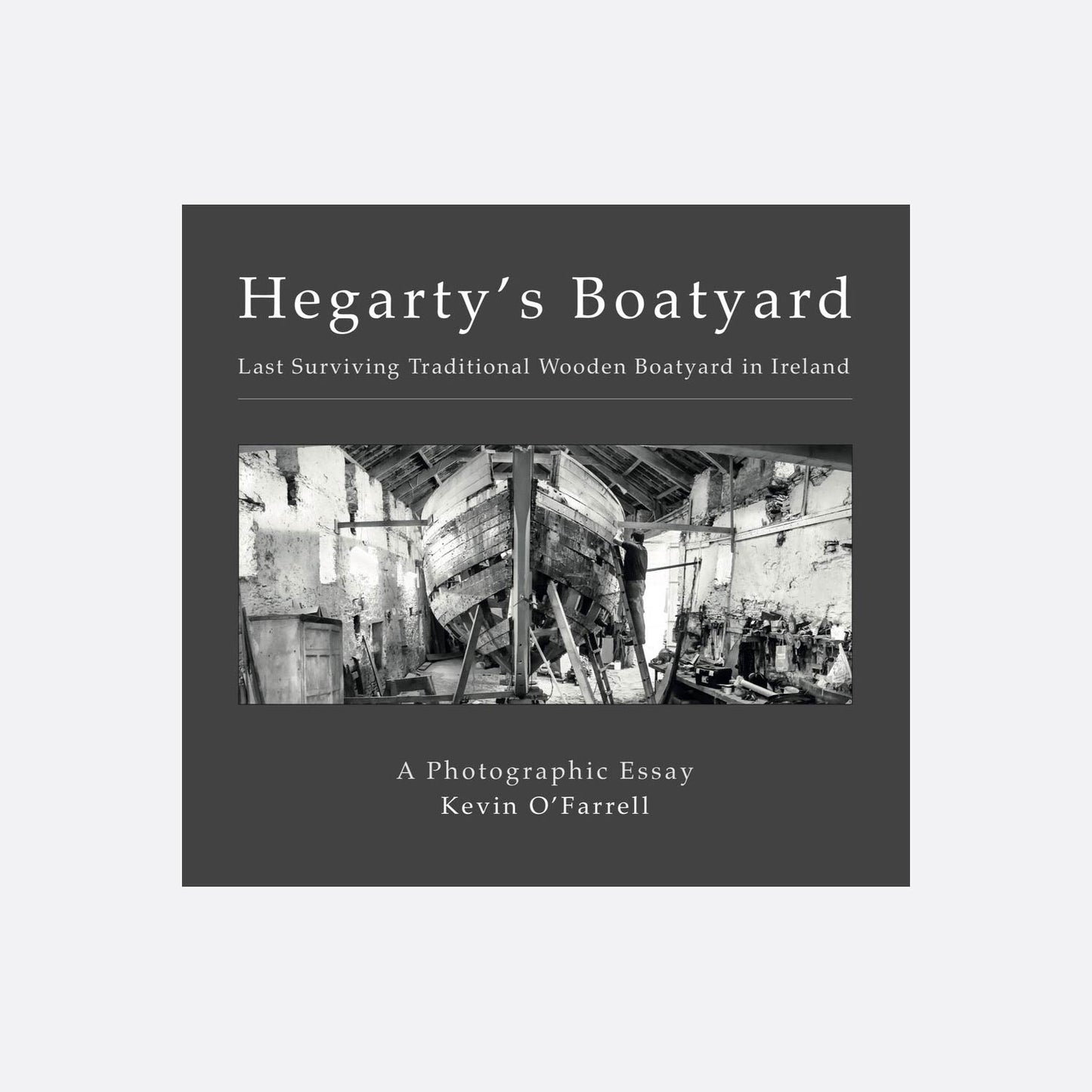 Cover of the book showing a black and white image of a boat being constructed in a workshop