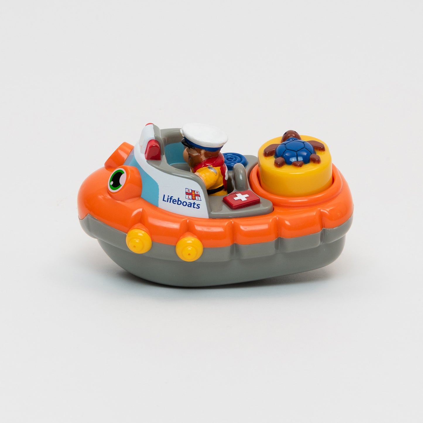 An RNLI lifeboat bath toy with mini lifeboat man figurine. 
