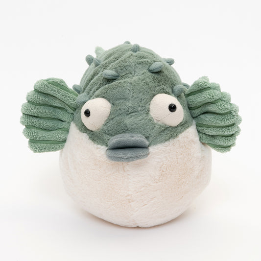 front shot of soft toy puffer fish in light green and white