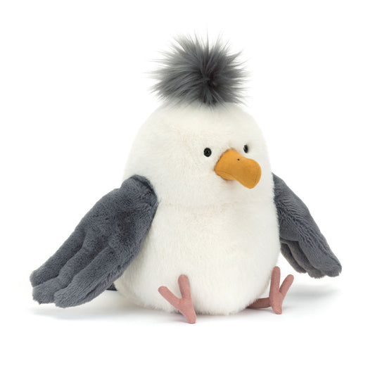 Plush toy Seagull with grey wings and a white body on a white background