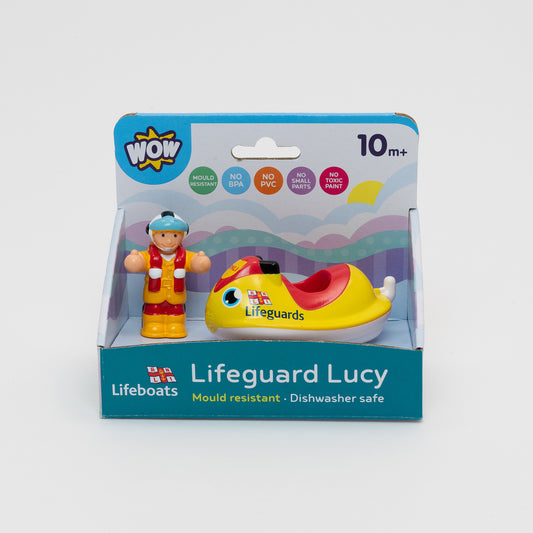 RNLI Lifegaurd Lucy Bath Toy.  Yellow and Red cartoon lifesaving jetski toy with detachable RNLI team member Lucy in her yellow waterproofs and helmet in carboard packaging.