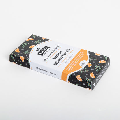 side shot of Christmas packaging showing Orange slices and winter foliage