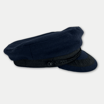 Navy blue cap with a black band on a light gray background