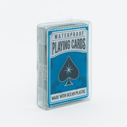 Playing cards in a clear plastic case with blue and white design on a light gray background