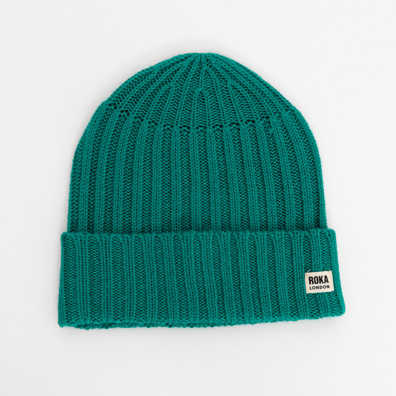 Teal coloured knitted beanie with ROKA branding