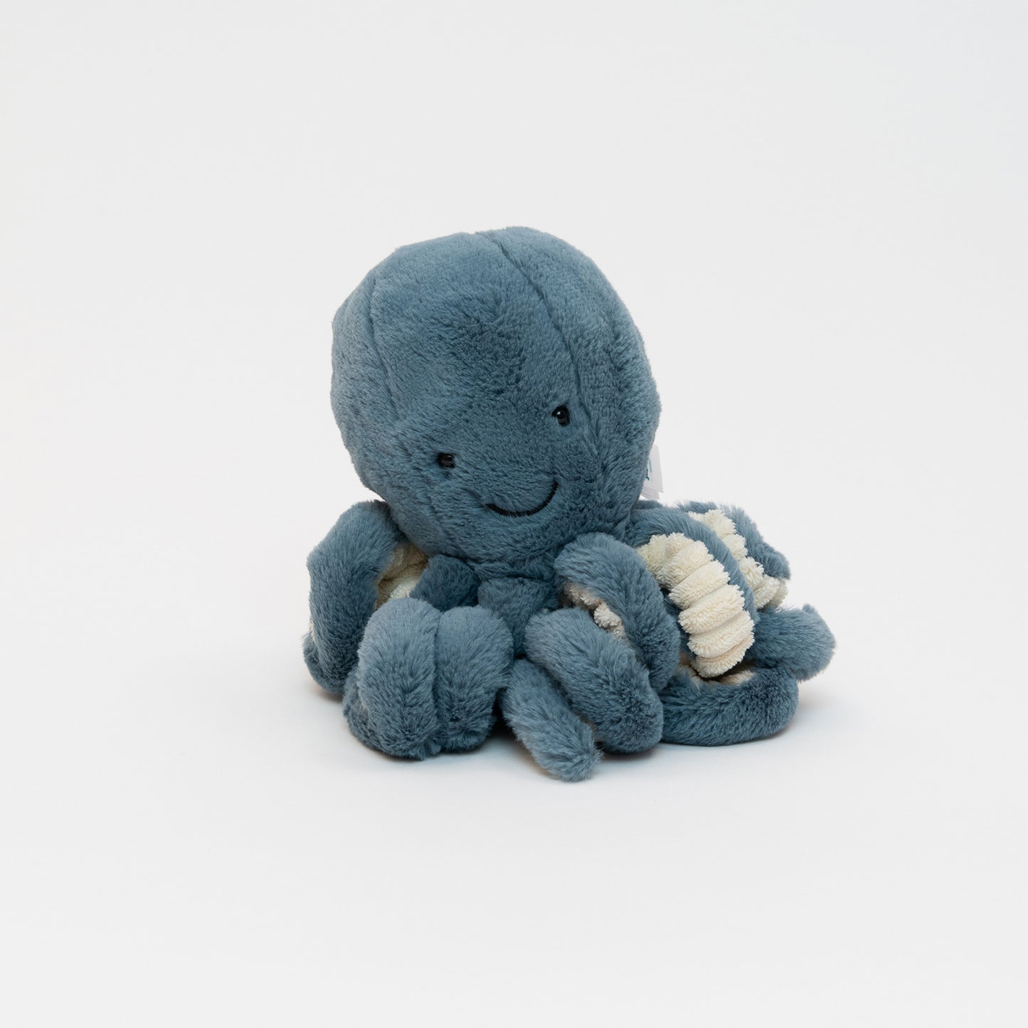 A blue Jellycat plush octopus pictured on a white background.