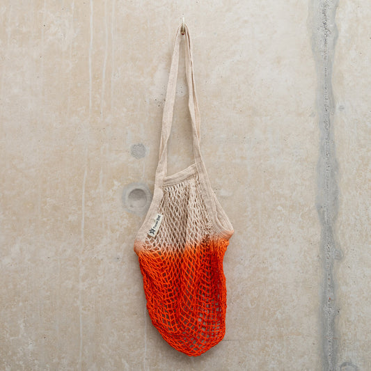 Natural colour string bag dip dyed in orange