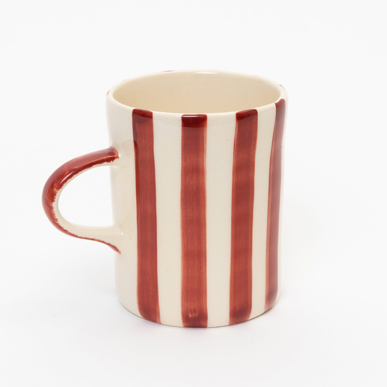 Red and white striped mug with red handle
