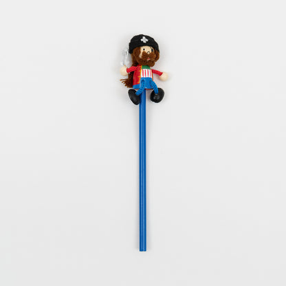 Pirate topped Pencil. Fun wood and fabric pirate to top of your blue pencil. Pirate complete with black crossbone hat, long brown string hair & mustache, red vest and blue dangly legs with black wood shoes.