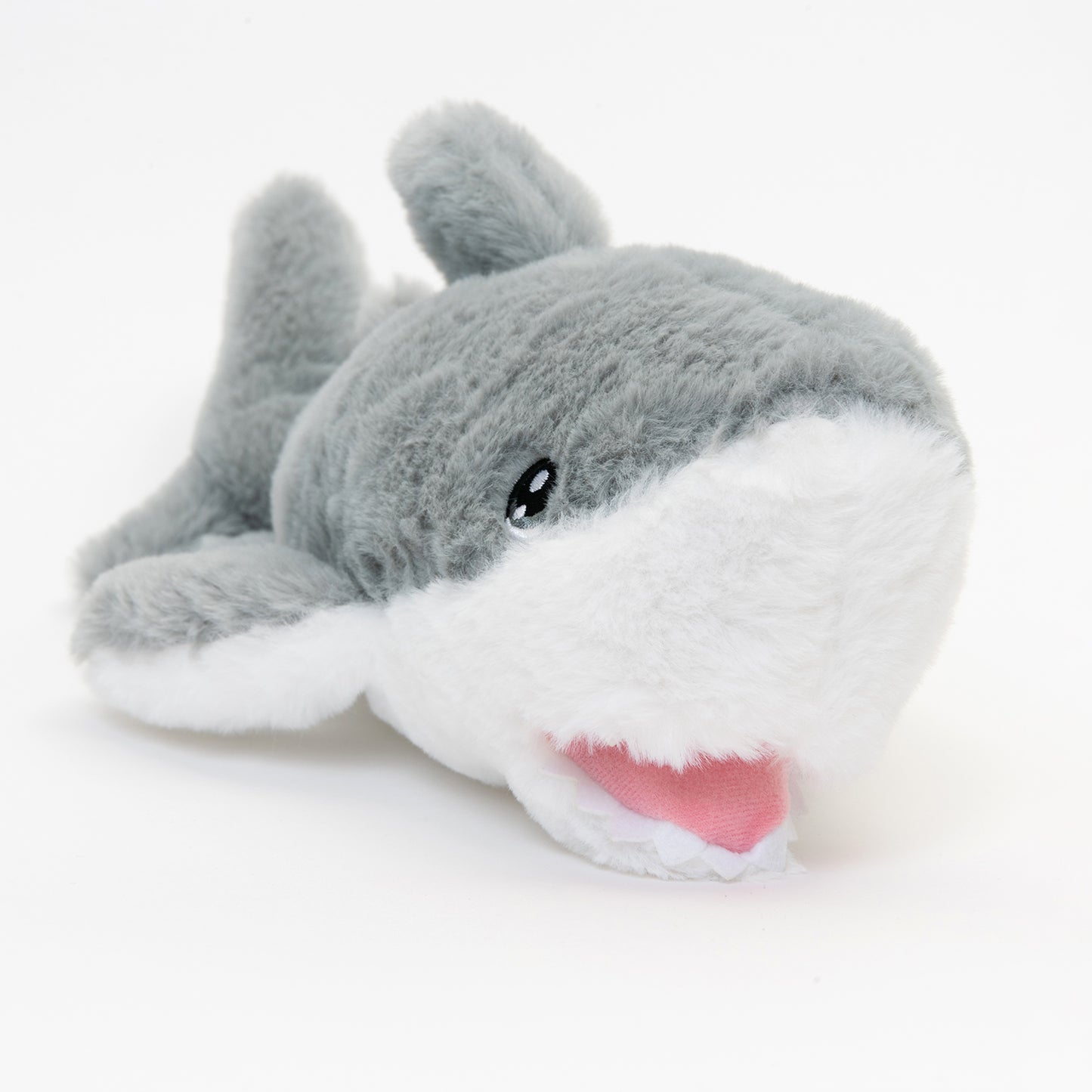 front shot of fluffy grey and white shark with open mouth